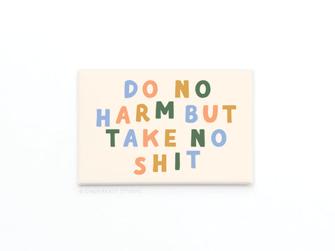 A vibrant Onderkast Studio refrigerator magnet features bold “DO NO HARM BUT TAKE NO SHIT” lettering on a light background—an empowering USA-made accessory.