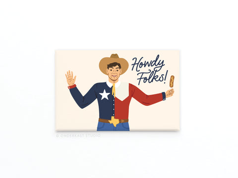 The Big Tex Refrigerator Magnet by Onderkast Studio features a smiling man in a cowboy hat and Texas flag shirt, waving and holding a corndog. Vibrant colors capture the State Fair of Texas spirit, complete with his classic “Howdy Folks!”.