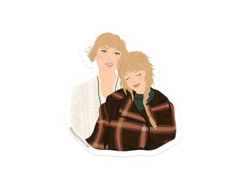 Illustration of two blonde women—one in a cream sweater, one in a brown plaid coat with braid—featured on the TS Folkevermore Sticker by Onderkast Studio. Made from weatherproof vinyl, its perfect for personalizing your space.
