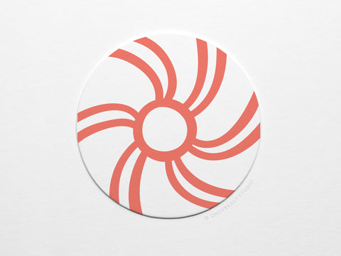 The Peppermint Candy Coaster Set by Onderkast Studio features white, circular pulp board coasters with a simple abstract design of six curved red-orange lines radiating from the center on a plain white background.