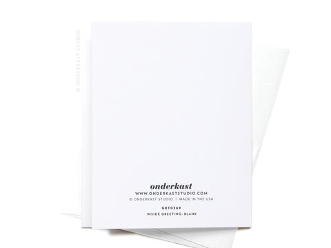 The Breast Wishes! Greeting Card by Onderkast Studio is a blank white card with their logo and website, shown atop a white envelope on a white background. Ideal for adding your own breast-themed design or personal birthday message inside.
