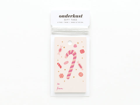 Onderkast Studios Candy Cane Gift Tag pack features pink and white candy cane designs with small candies and stars, to: and from: in pink, printed in the USA on quality card stock, labeled GIFT TAGS at the top.