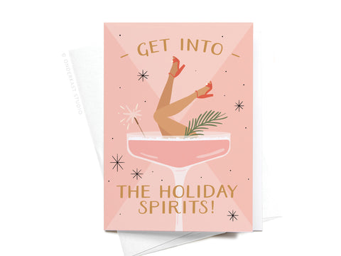 Onderkast Studio’s Get Into the Holiday Spirits! Cocktail Folded Greeting Note Set of 10 features illustrated legs in red heels kicking from a cocktail glass, with festive text and vibrant, premium printing on a pink starry background.