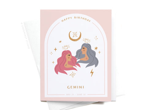 The Onderkast Studio Happy Birthday Gemini Zodiac Greeting Card features two illustrated women—one with pink hair, one with gray hair—surrounded by stars, a crescent moon, GEMINI, Happy Birthday, and the dates May 21 - June 20.