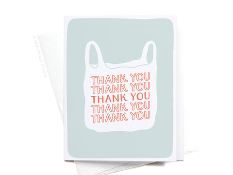 The Thank You Plastic Bag Greeting Card by Onderkast Studio showcases a white plastic bag with THANK YOU printed five times in bold red letters on a light grey background, offering an eco-friendly and playful message.