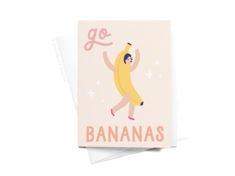 The Go Bananas Sticker Greeting Card by Onderkast Studio features a cheerful person in a banana costume with go BANANAS text and a sparkly background, printed on thick white card stock for a playful, charming touch.