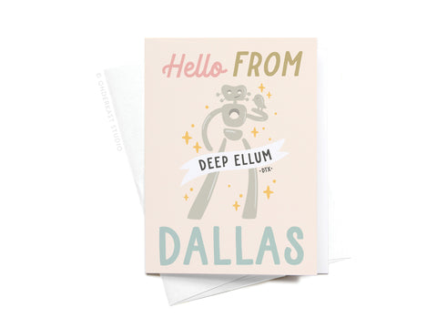The Hello From Dallas Traveling Man Sticker Greeting Card by Onderkast Studio features a pastel robot with a Deep Ellum banner. Printed on thick white card stock, it comes with a matching envelope.