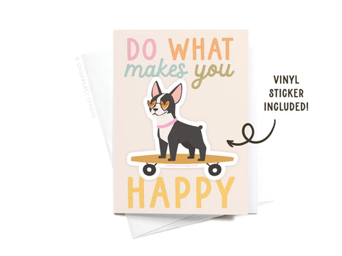 The Onderkast Studio Do What Makes You Happy Dog Sticker Greeting Card is printed on white card stock, features a cartoon dog with heart sunglasses on a skateboard and includes a matching vinyl sticker.