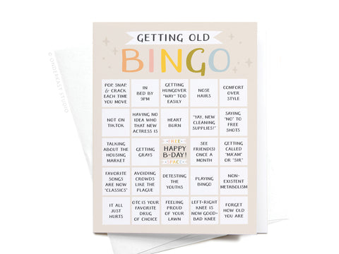 The Onderkast Studio Getting Old Bingo Greeting Card highlights funny signs of aging, such as joints popping and loud phones, with a Free Happy B-Day! Space at the center.