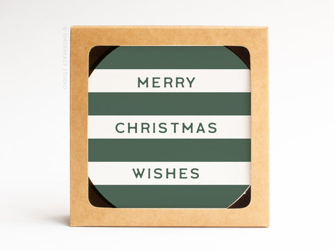 Onderkast Studio’s Merry Christmas Wishes Coaster Set features square letterpress coasters with green and white stripes, Merry Christmas Wishes in green capitals, and comes packaged in a cardboard box. Made from sturdy pulp board paper.